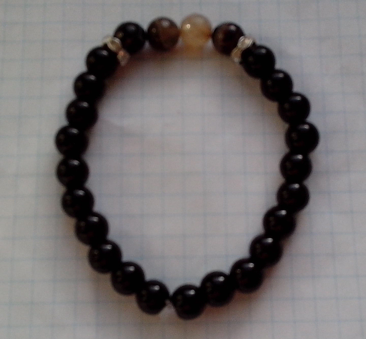 1634134725_braslet-chernyj-i